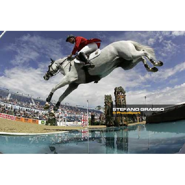 Christian Ahlmann on Coster at the waterjump during the 2nd rating competition for the individual and Team Fei Mannheim, 16th august 2007 ph. Stefano Grasso