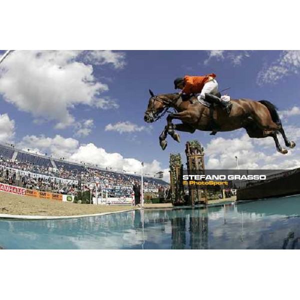 Albert Zoer on Okidoki at the waterjump during the 2nd rating competition for the individual and Team Fei Mannheim, 16th august 2007 ph. Stefano Grasso