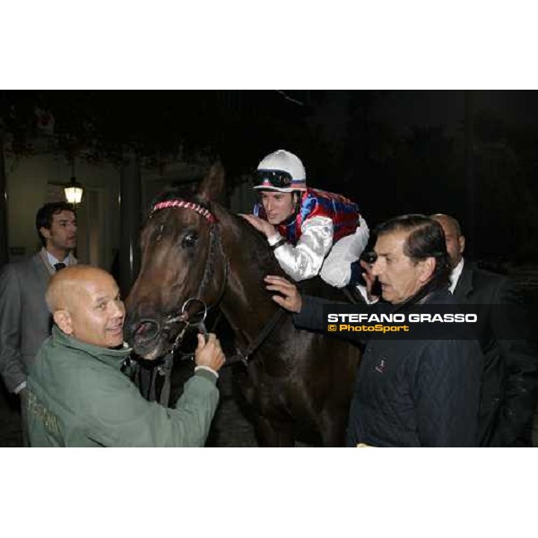 Mirco Demuro with Armando Renzoni and Le Cadre Noir after winning the Premio Omenoni Milan San Siro , 14th october 2007 ph. Stefano Grasso