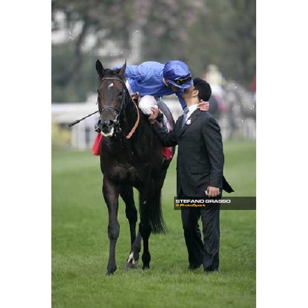 Frankie Dettori comes back in triumph on Ramonti after winning the Cathay Pacific Hong Kong Cup and congratulates with trainer Saeed Bin Suroor Hong Kong, Sha Tin racetrack, 9th dec. 2007 ph. Stefano Grasso