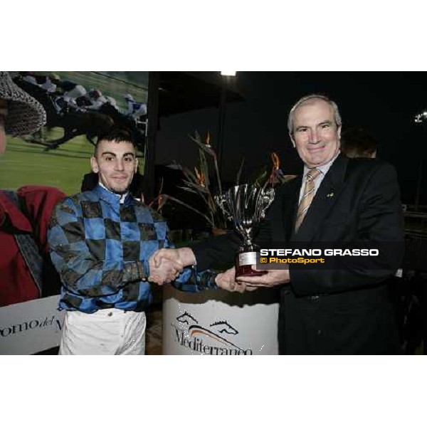 Mr. Robert Roucayrol gives the cup to Silvano Mulas winner with Cocodrail of Premio Coppa Oro di Siracusa at Mediterraneo racecourse Siracusa, 12th jan. 2008 ph. Stefano Grasso