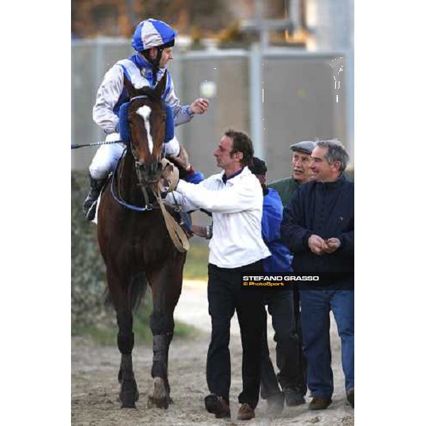 Dirk Fuhrmann on Blu Santillana comes back to the stable after winning the LVIII Gran Corsa Siepi di Roma with Franco Contu close to him Rome Capannelle, 17th february 2008 ph. Stefano Grasso