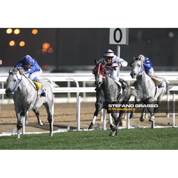 David Bouland on Al Dahma (in the middle) flyes toward the line and wins the Qatar International Trophy - Group 1-P/A Doha, Al Ryyan Park, 28th febr. 2008 ph. Stefano Grasso