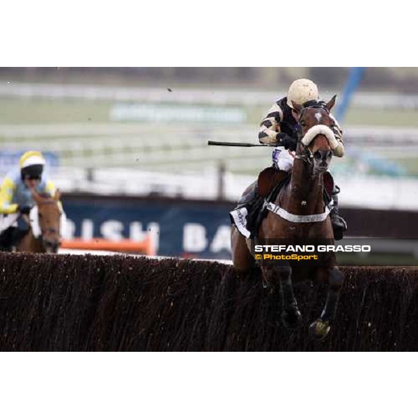 Denis O\' Regan on Tidal Bay jumps the last fence and goes to win the Irish Indipendent Arkle Challenge Trophy Steeple Chase Cheltenham The Festival , 1st day 11th march 2008 ph. Stefano Grasso