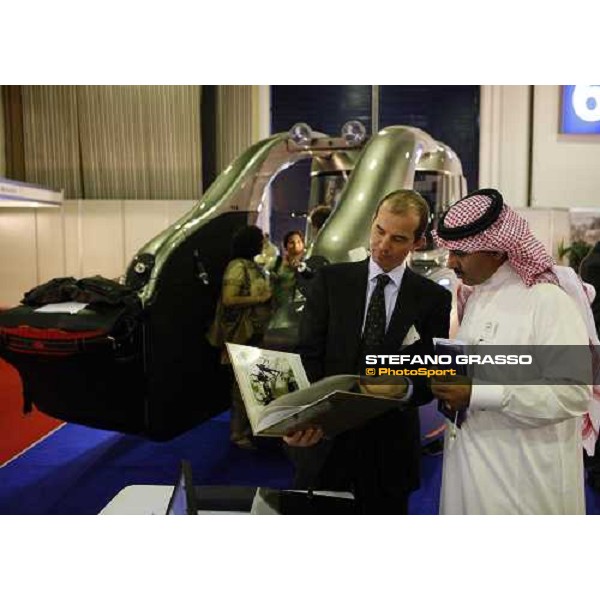 Daniele Camuffo explains the Kurtsystems car at the Dubai Arabian horse show fair Dubai, 23th march 2008 ph. Stefano Grasso