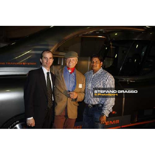 Daniele Camuffo, Monty Roberts and trainer Satish pose in front of the Kurt car systems at the Dubai Arabian horse show fair Dubai, 23th march 2008 ph. Stefano Grasso
