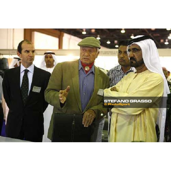 H.H. Sheikh Mohamed bin Rashid Al Maktoum leastening Monty Roberts explains he Kurt car systems at the Dubai Arabian horse show fair, with Daniele Camuffo at left Dubai, 23th march 2008 ph. Stefano Grasso