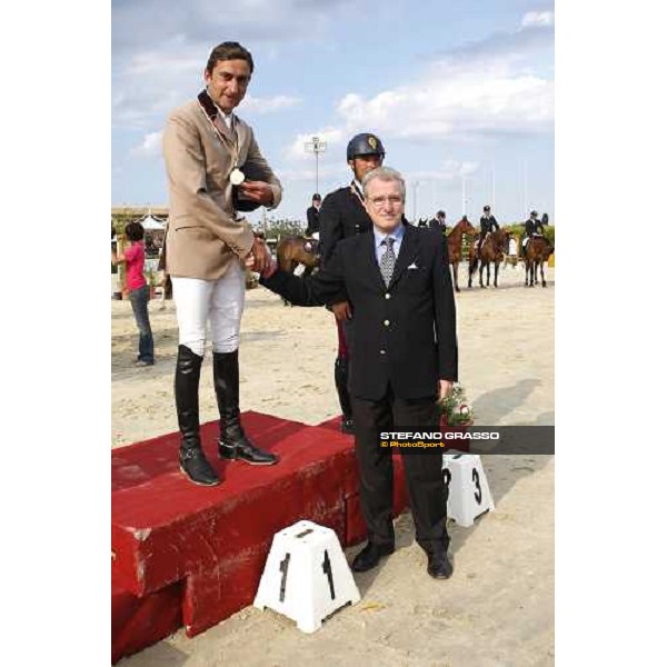 the podium of italian showjumping championship - Piergiorgio Bucci, italian champion 2008, receives the congratulation from ing. Cesare Croce Augusta, 27th april 2008 ph. Stefano Grasso
