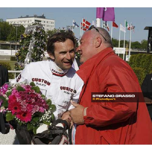 Giuseppe Lenzi congratulates with Jean Michel Bazire after winning with Exploit Caf the Elitloppet Solvalla, 25th may 2008 ph. Stefano Grasso