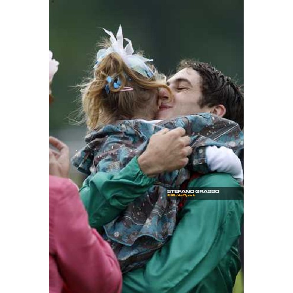 Christophe Soumillon kisses his daughter after winning the Prix de Diane Chantilly, 8th june 2008 ph. Stefano Grasso