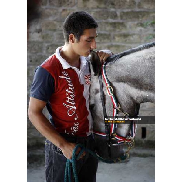 a groom with his horse during the veterinary visit for the horses of Palio di Siena loc. Il Ceppo, Siena, 8th august 2008 ph. Stefano Grasso