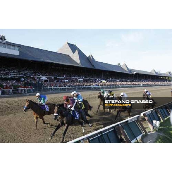 Alan Garcia on Da\' Tara leads the group on the first turn of the 139th running of the Travers presented by Shadwell Farm.. The winner Colonel John in the middle of the group Saratoga, 23rd august 2008 ph. Stefano Grasso