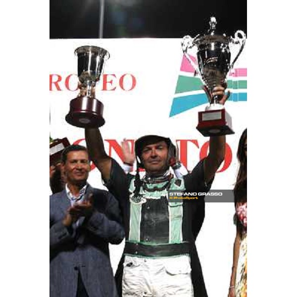 Enrico Bellei stands the cups after winning the Campionato Europeo with Ghiaccio del Nord Cesena, 6th september 2008 ph. Stefano Grasso