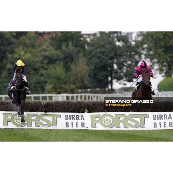 at left Raffaele Romano on Fatal Mac jumps the last fence and goes to win the 64¡ Premio delle Nazioni - Mem. M.Rocca beating Sir Bahhare Merano Maia, 26th sept. 2008 ph. Stefano Grasso
