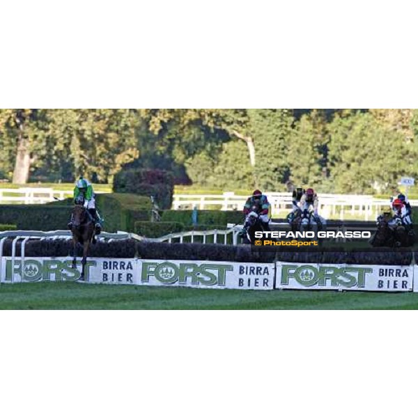 Raffaele Romano on Sharstar jumps the last fence and goes to win the 69.¡ Gran Premio Merano Forst followed by L\' As de Pembo Merano, 28th sep. 2008 ph. Stefano Grasso