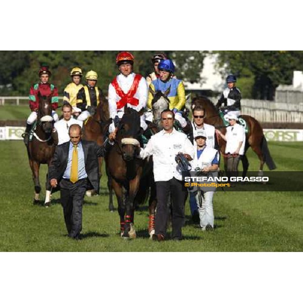 X. Hondier on Asselin of Razza Dormello Olgiata parading before the start of the 69.¡Gran Premio Merano Forst followed by Duero and L\' As de Pembo at left Merano, 28th sep. 2008 ph. Stefano Grasso