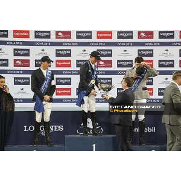 LGCT of Doha - Overall standing Prize giving ceremony - Jan Tops (President of LGCT and co-founder of GCL) presents the Longines watch to 2018 LGCT Champion of Champions Ben Maher (GBR) - Doha - Al Shaqab, 10 November 2018 - ph.Stefano Grasso/LGCT