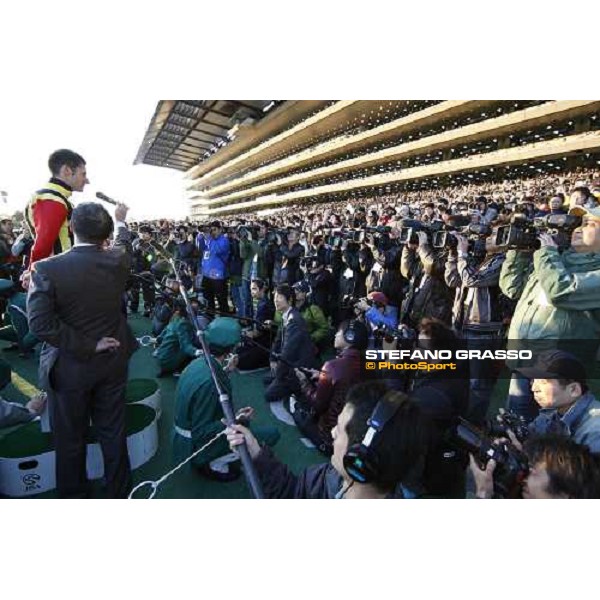 an happy Mirco Demuro interviwed in front of more than 100.000 racegoers after winning the Japan Cup at Fuchu racecourse. Tokyo, 30th nov. 2008 ph. Stefano Grasso