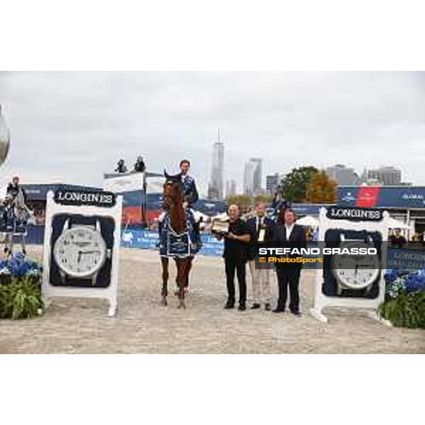 LGCT of New York - Grand Prix - Prize giving ceremony - Ben Maher (GBR), Andre Agassi, Charles Villoz (VP and Head of International Sales at Longines), Jan Tops (President of LGCT and co-founder of GCL) - New York, Governors Island - 29 September 2019 - ph.Stefano Grasso/LGCT