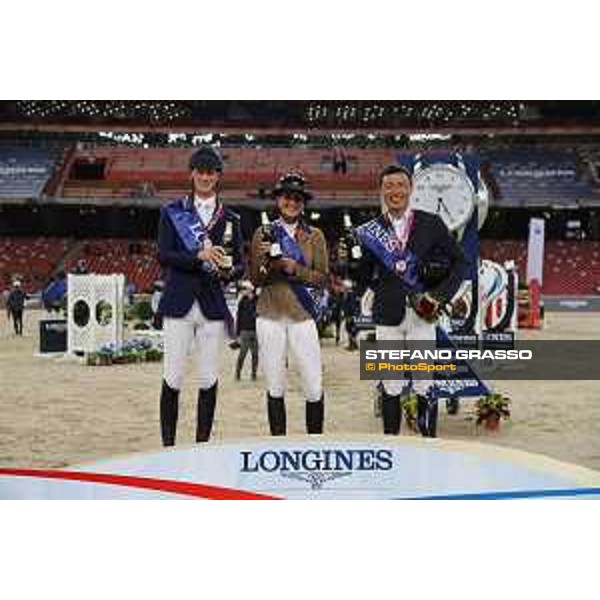 Longines Grand Prix - The Podium of Longines Grand Prix - Penelope Leprevost,Daniel Deusser,Bin Zhang - Champagne celebration Beijing, Bird\'s Nest 13th October 2019 Ph.Stefano Grasso/LEBM