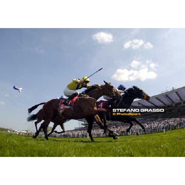 Packed Sandown stands see Hurrican Alan, Paul Dobbs, (far side) beat Gateman, Keith Dalgleih in the group 2 Betfred.com mile 24-4-04 pipc bill Selwyn