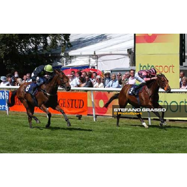Richard Hughes on Jewel in the Sand( at right) beats Salsa Brava in The Chippenham Lodge Stakes with Jewel In The Sand Newmarket, 6th june 2004 ph. Stefano Grasso