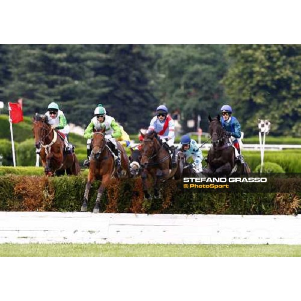 Raffaele Romano on Sharstar jumps a fence and goes to win the 1¡ Grande Steeple-Chase d\' Europa Merano, 21st june 2009 ph. Stefano Grasso