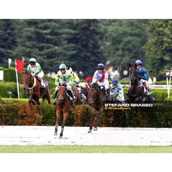 Raffaele Romano on Sharstar jumps a fence and goes to win the 1¡ Grande Steeple-Chase d\' Europa Merano, 21st june 2009 ph. Stefano Grasso