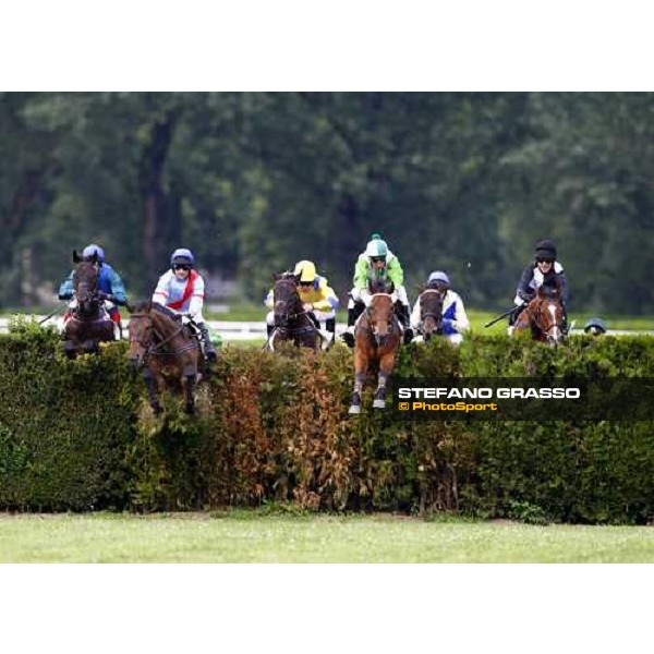 Raffaele Romano on Sharstar jumps a fence and goes to win the 1¡ Grande Steeple-Chase d\' Europa Merano, 21st june 2009 ph. Stefano Grasso