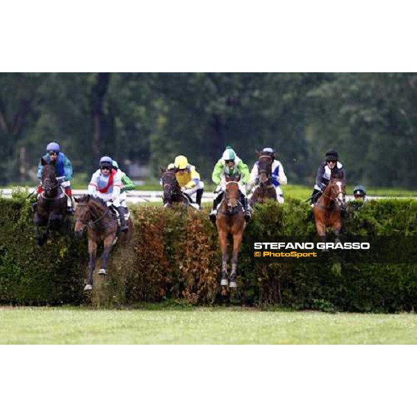 Raffaele Romano on Sharstar jumps a fence and goes to win the 1¡ Grande Steeple-Chase d\' Europa Merano, 21st june 2009 ph. Stefano Grasso
