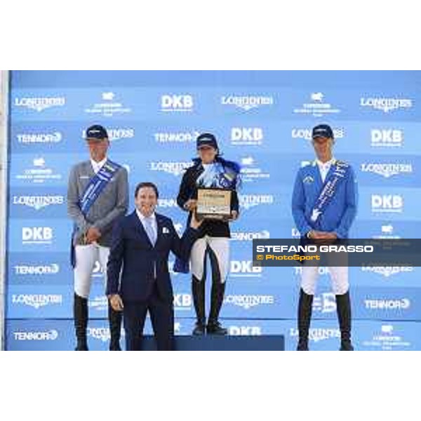 LGCT of Berlin - Grand Prix Prize giving ceremony - The podium: 1st Danielle G. Waldman (ISR), 2nd Ludger Beerbaum (GER) and 3rd Christian Ahlmann (GER), Longines watch - Berlin, Sommergarten - 27 July 2019 - ph.Stefano Grasso/LGCT