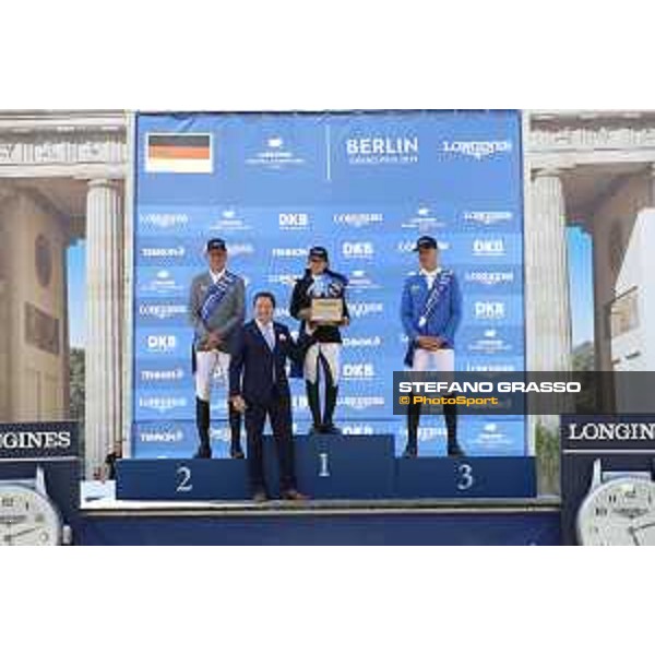 LGCT of Berlin - Grand Prix Prize giving ceremony - The podium: 1st Danielle G. Waldman (ISR), 2nd Ludger Beerbaum (GER) and 3rd Christian Ahlmann (GER), Longines watch - Berlin, Sommergarten - 27 July 2019 - ph.Stefano Grasso/LGCT