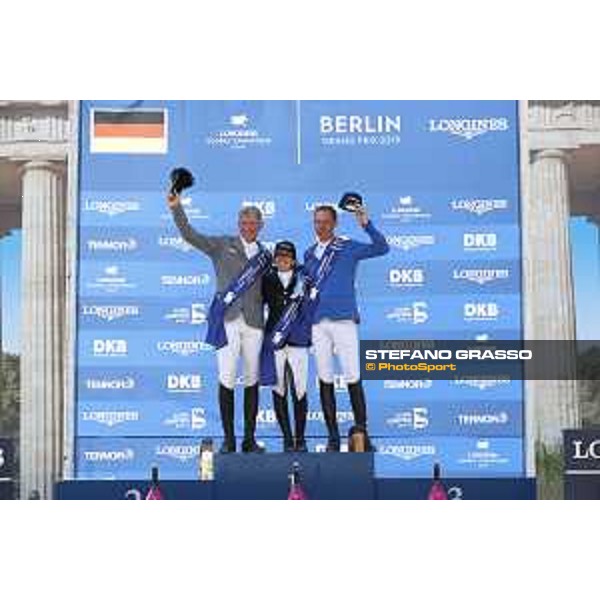LGCT of Berlin - Grand Prix Prize giving ceremony - The podium: 1st Danielle G. Waldman (ISR), 2nd Ludger Beerbaum (GER) and 3rd Christian Ahlmann (GER) - Berlin, Sommergarten - 27 July 2019 - ph.Stefano Grasso/LGCT