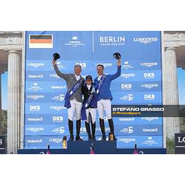 LGCT of Berlin - Grand Prix Prize giving ceremony - The podium: 1st Danielle G. Waldman (ISR), 2nd Ludger Beerbaum (GER) and 3rd Christian Ahlmann (GER) - Berlin, Sommergarten - 27 July 2019 - ph.Stefano Grasso/LGCT
