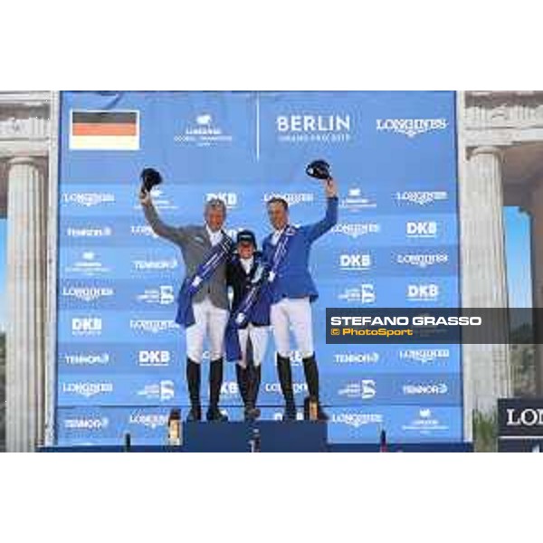 LGCT of Berlin - Grand Prix Prize giving ceremony - The podium: 1st Danielle G. Waldman (ISR), 2nd Ludger Beerbaum (GER) and 3rd Christian Ahlmann (GER) - Berlin, Sommergarten - 27 July 2019 - ph.Stefano Grasso/LGCT