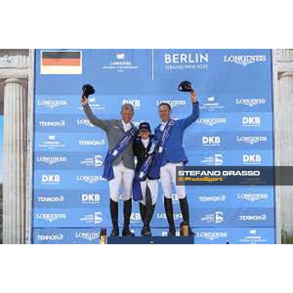 LGCT of Berlin - Grand Prix Prize giving ceremony - The podium: 1st Danielle G. Waldman (ISR), 2nd Ludger Beerbaum (GER) and 3rd Christian Ahlmann (GER) - Berlin, Sommergarten - 27 July 2019 - ph.Stefano Grasso/LGCT