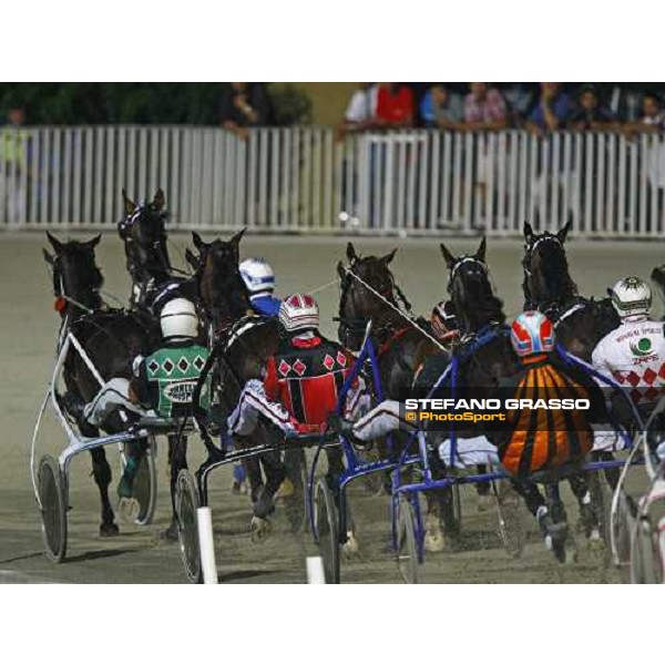 Enrico Bellei with Mirtillo Rosso leads on Meriggio. Mulberry Street and Mario Tommaseo the Gran Premio Nazionale - Trofeo Snai - Memorial Gianni Ferraris Milan, 2nd july 2009 ph.Stefano Grasso