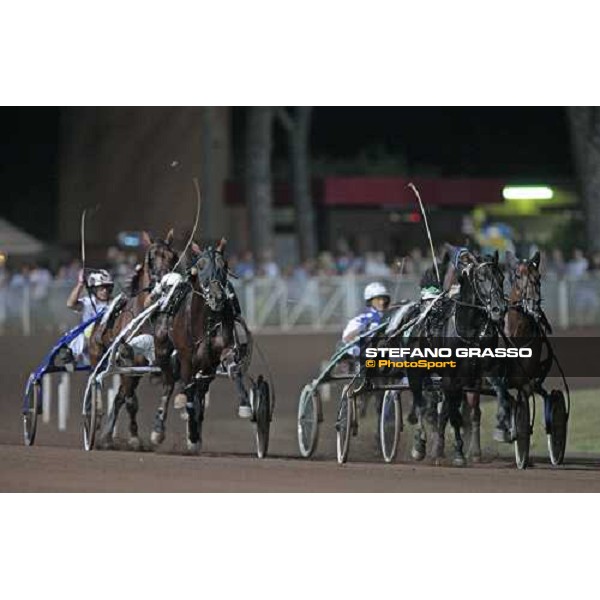 Andrea Guzzinati with Opal Viking, at the last straight of the Gran Premio Città di Montecatini, leads on Giampaolo Minnucci with Irina, winner, and Enrico Bellei with Iago d\' Alfa Montecatini, 15th august 2009 ph. Stefano Grasso