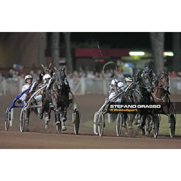 Andrea Guzzinati with Opal Viking, at the last straight of the Gran Premio Città di Montecatini, leads on Giampaolo Minnucci with Irina, winner and Enrico Bellei with Iago d\' Alfa Montecatini, 15th august 2009 ph. Stefano Grasso