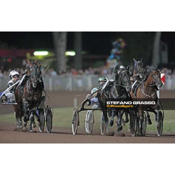 the last straight the Gran Premio Città di Montecatini. Giampaolo Minnucci with Irina, winner, just behind Andrea Guzzinati with Opal Viking and followed by Enrico Bellei with Iago d\' Alfa Montecatini, 15th august 2009 ph. Stefano Grasso