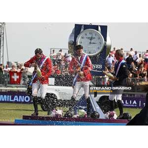 FEI Jumping European Championship Milano 2023 - Milano, San Siro galopp racecourse - 3 September 2023 - ph.Stefano Grasso Champagne celebration - Steve Guerdat, Philipp Weishaupt and Julien Epaillard