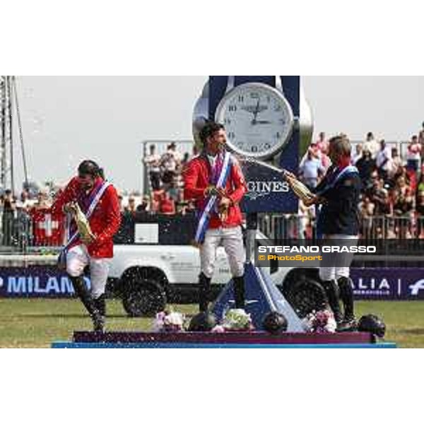 FEI Jumping European Championship Milano 2023 - Milano, San Siro galopp racecourse - 3 September 2023 - ph.Stefano Grasso Champagne celebration - Steve Guerdat, Philipp Weishaupt and Julien Epaillard