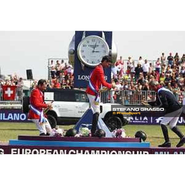 FEI Jumping European Championship Milano 2023 - Milano, San Siro galopp racecourse - 3 September 2023 - ph.Stefano Grasso Champagne celebration - Steve Guerdat, Philipp Weishaupt and Julien Epaillard