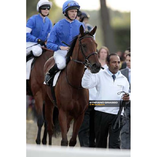 Ted Durcan on Flying Cloud enters the track and his followed by Hayley Turner on Lady Marian before the start of the the Premio Lydia Tesio Shadwell Rome Capanannelle, 25th oct. 2009 Ph.Stefano Grasso
