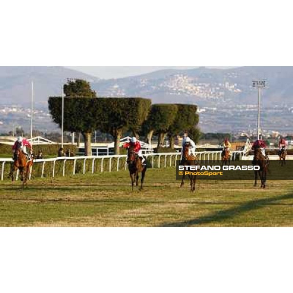 Paul A.Johnson on Luci a Capannelle and Monjon on Invincible Joy at few meters to the line of the Premio Criterium d\' Inverno, followed by Night rider and Fermi Rome, 7th february 2010 ph. Stefano Grasso