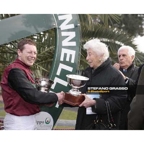 Paul A. Johnson receives the cup from Maria Sole Agnelli after winning the 121¡ Grande Steeple Chase di Romna - Mem. Gen. Mario Argenton Rome, 14th february 2010 ph. Stefano Grasso