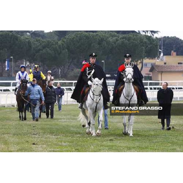 Elio Pautasso and the Carabinieri a Cavallo open the parade of the 60.a Gran Corsa Siepi di Roma. at left Dirk Fuhrmann on Frammassone Roma, 14th february 2010 ph. Stefano Grasso