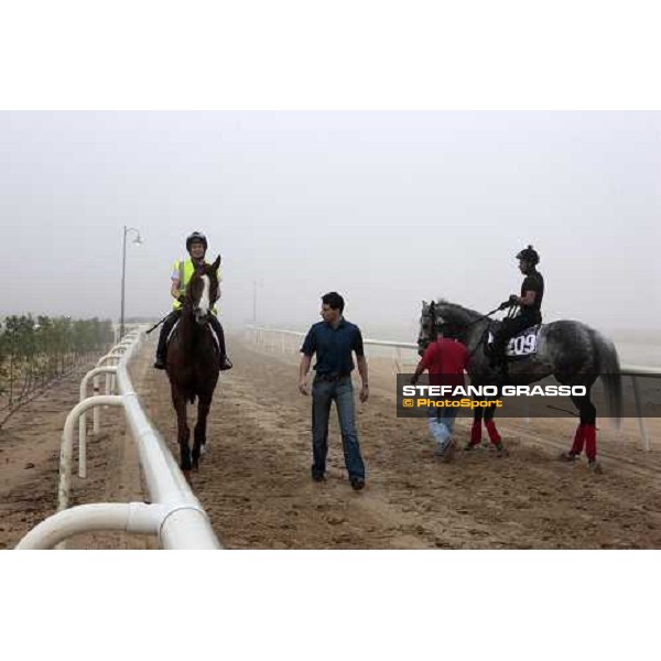 Marco Botti walks back to the stable with Gitano Hernando after a canter Dubai - Meydan, 25th march 2010 ph. Stefano Grasso