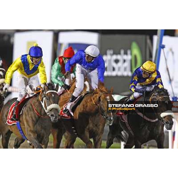 immediately after the finish line of the Dubai World Cup - Tiago Pereira on Gloria de Campeao winner, Kevin Shea on Lizard\'s Desire and Ahmad Ajtebi on Allibar Dubai - Meydan, 26th march 2010 ph. Stefano Grasso