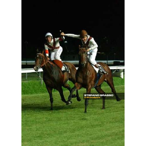 Frankie Dettori and Pinuccio Molteni parading in front of 5000 people after Criterium Varesino Varese Le Bettole, 7th august 2004 ph. Stefano Grasso
